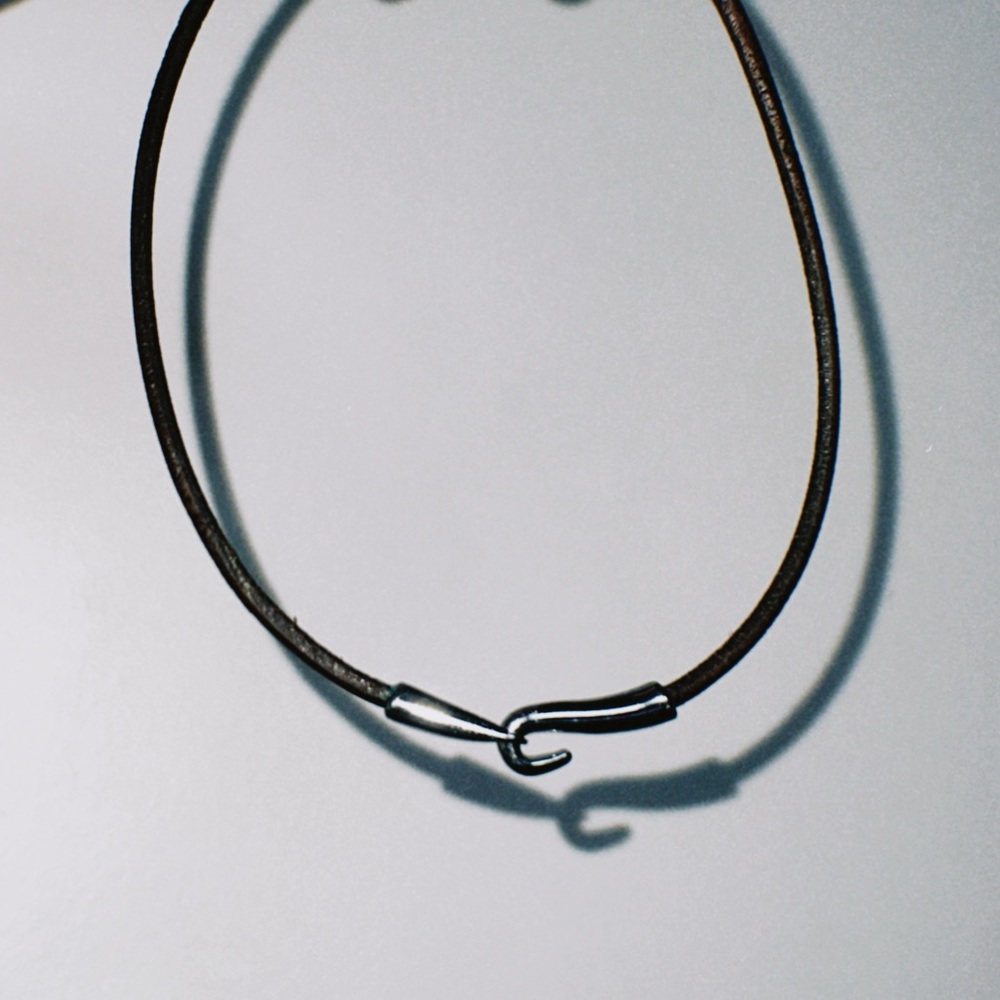 Leather choker with fish hook closure